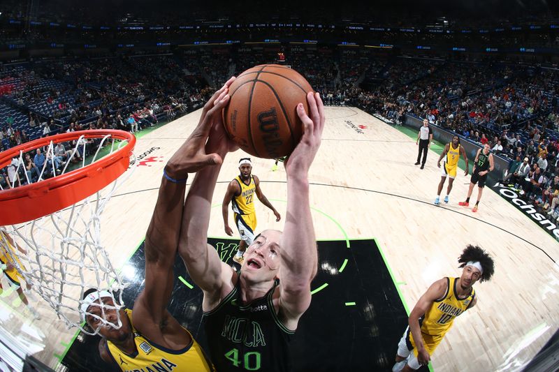 NEW ORLEANS, LA - MARCH 1:  Cody Zeller #40 of the New Orleans Pelicans grabs a rebound during the game against the Indiana Pacers on March 1, 2024 at the Smoothie King Center in New Orleans, Louisiana. NOTE TO USER: User expressly acknowledges and agrees that, by downloading and or using this Photograph, user is consenting to the terms and conditions of the Getty Images License Agreement. Mandatory Copyright Notice: Copyright 2024 NBAE (Photo by Layne Murdoch Jr./NBAE via Getty Images)