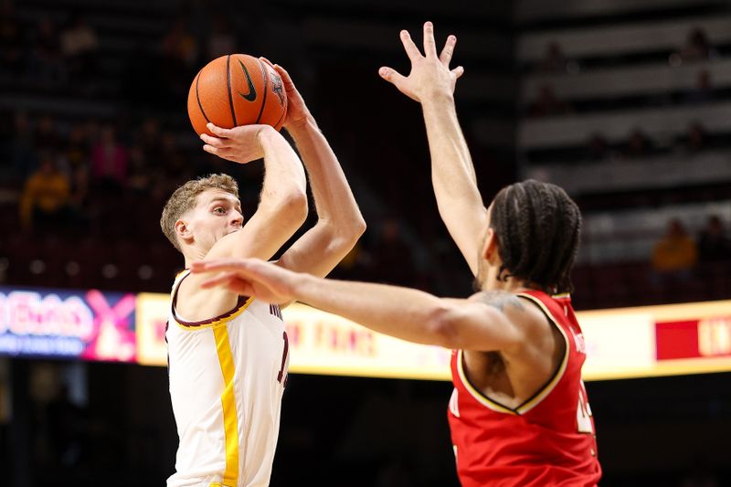 Feb 8, 2026; Minneapolis, Minnesota, USA; Minnesota Golden Gophers forward Cade Tyson (10) shoots over Maryland Terrapins center Collin Metcalf (45) during the first half at Williams Arena. Mandatory Credit: Matt Krohn-Imagn Images
