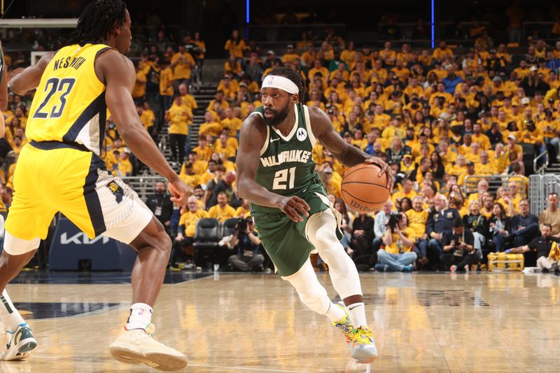 INDIANAPOLIS, IN - APRIL 26: Patrick Beverley #21 of the Milwaukee Bucks dribbles the ball during the game against the Indiana Pacers during Round 1 Game 3 of the 2024 NBA Playoffs on April 26, 2024 at Gainbridge Fieldhouse in Indianapolis, Indiana. NOTE TO USER: User expressly acknowledges and agrees that, by downloading and or using this Photograph, user is consenting to the terms and conditions of the Getty Images License Agreement. Mandatory Copyright Notice: Copyright 2023 NBAE (Photo by Nathaniel S. Butler/NBAE via Getty Images)