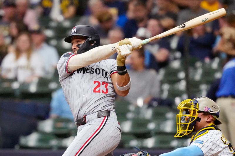 May 16, 2025; Milwaukee, Wisconsin, USA;  Minnesota Twins third baseman Royce Lewis (23) singles during the fourth inning against the Milwaukee Brewers at American Family Field. Mandatory Credit: Jeff Hanisch-Imagn Images