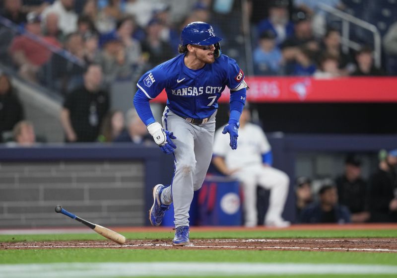 May 1, 2024; Toronto, Ontario, CAN; Kansas City Royals shortstop Bobby Witt Jr. (7) hits an RBI single against the Toronto Blue Jays during the sixth inning at Rogers Centre. Mandatory Credit: Nick Turchiaro-USA TODAY Sports