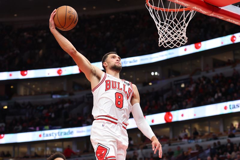 CHICAGO, ILLINOIS - NOVEMBER 06: Zach LaVine #8 of the Chicago Bulls dunks against the Utah Jazz during the first half at the United Center on November 06, 2023 in Chicago, Illinois. NOTE TO USER: User expressly acknowledges and agrees that, by downloading and or using this photograph, User is consenting to the terms and conditions of the Getty Images License Agreement. (Photo by Michael Reaves/Getty Images)