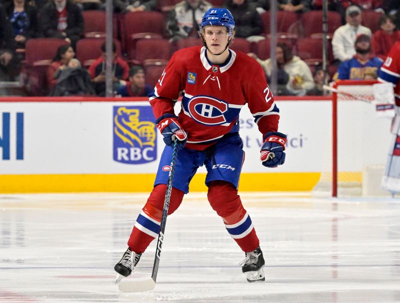 Sep 29, 2022; Montreal, Quebec, CAN; Montreal Canadiens defenseman Kaiden Guhle (21) during the third period against the Winnipeg Jets at the Bell Centre. Mandatory Credit: Eric Bolte-USA TODAY Sports