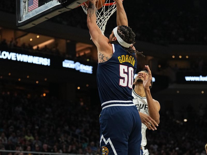 AUSTIN, TX - MARCH 15: Aaron Gordon #50 of the Denver Nuggets dunks the ball during the game against the San Antonio Spurs on March 15, 2024 at the Moody Center in Austin, Texas. NOTE TO USER: User expressly acknowledges and agrees that, by downloading and/or using this Photograph, user is consenting to the terms and conditions of the Getty Images License Agreement. Mandatory Copyright Notice: Copyright 2024 NBAE (Photo by Garrett Ellwood/NBAE via Getty Images)