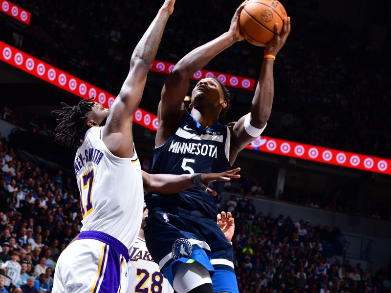 MINNEAPOLIS, MN -  APRIL 27:  Anthony Edwards #5 of the Minnesota Timberwolves drives to the basket during the game against the Los Angeles Lakers during Round 1 Game 4 of the 2025 NBA Playoffs on April 27, 2025 at Target Center in Minneapolis, Minnesota. NOTE TO USER: User expressly acknowledges and agrees that, by downloading and or using this Photograph, user is consenting to the terms and conditions of the Getty Images License Agreement. Mandatory Copyright Notice: Copyright 2025 NBAE (Photo by Barry Gossage/NBAE via Getty Images)