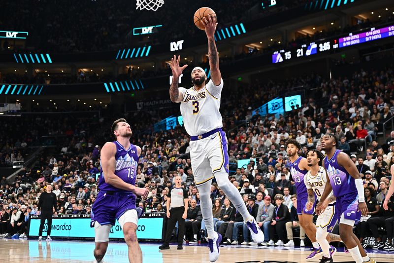 SALT LAKE CITY, UT - DECEMBER 1: Anthony Davis #3 of the Los Angeles Lakers drives to the basket during the game against the Utah Jazz on December 1, 2024 at Delta Center in Salt Lake City, Utah. NOTE TO USER: User expressly acknowledges and agrees that, by downloading and or using this Photograph, User is consenting to the terms and conditions of the Getty Images License Agreement. Mandatory Copyright Notice: Copyright 2024 NBAE (Photo by Jamie Sabau/NBAE via Getty Images)