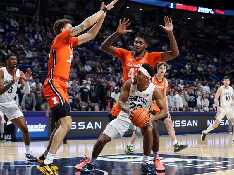 Feb 14, 2023; University Park, Pennsylvania, USA; Penn State Nittany Lions guard Jalen Pickett (22) dribbles the ball in the paint as Illinois Fighting Illini forward Coleman Hawkins (33) and forward Dain Dainja (42) defend during the first half at Bryce Jordan Center. Mandatory Credit: Matthew OHaren-USA TODAY Sports