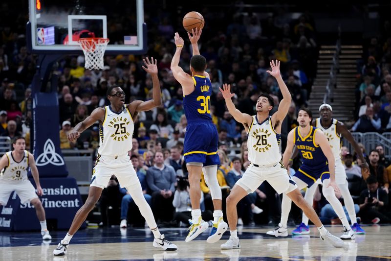 INDIANAPOLIS, INDIANA - FEBRUARY 08: Stephen Curry #30 of the Golden State Warriors shoots over Jalen Smith #25 and Ben Sheppard #26 of the Indiana Pacers in the first quarter at Gainbridge Fieldhouse on February 08, 2024 in Indianapolis, Indiana. NOTE TO USER: User expressly acknowledges and agrees that, by downloading and or using this photograph, User is consenting to the terms and conditions of the Getty Images License Agreement. (Photo by Dylan Buell/Getty Images)