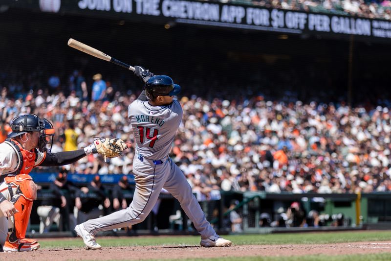 Apr 21, 2024; San Francisco, California, USA;  Arizona Diamondbacks catcher Gabriel Moreno (14) hits a two-run single against the San Francisco Giants during the sixth inning at Oracle Park. Mandatory Credit: John Hefti-USA TODAY Sports