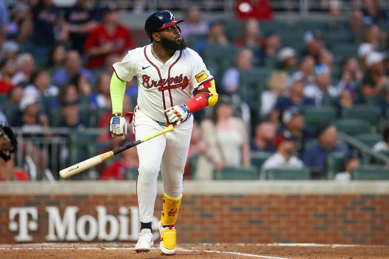 May 8, 2024; Atlanta, Georgia, USA; Atlanta Braves designated hitter Marcell Ozuna (20) hits a solo home run against the Boston Red Sox in the third inning at Truist Park. Mandatory Credit: Brett Davis-USA TODAY Sports
