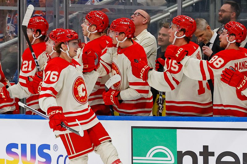 Feb 24, 2024; Edmonton, Alberta, CAN; The Calgary Flames celebrate a goal scored by forward Martin Pospisil (76) during the first period against the Edmonton Oilers at Rogers Place. Mandatory Credit: Perry Nelson-USA TODAY Sports