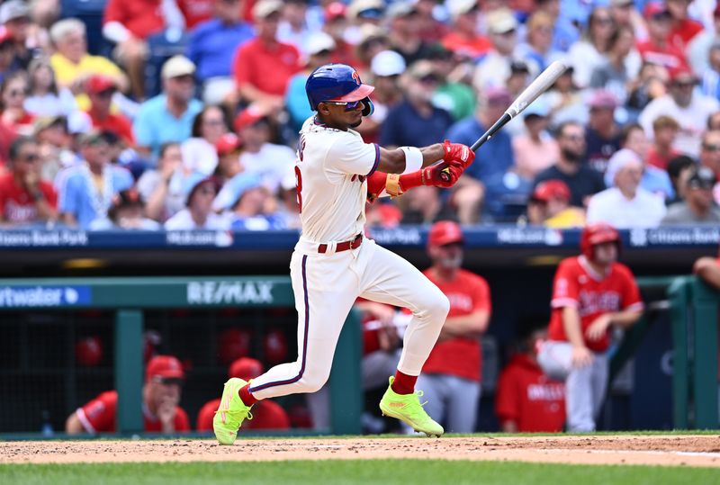 Aug 30, 2023; Philadelphia, Pennsylvania, USA; Philadelphia Phillies outfielder Johan Rojas (18) hits an RBI single against the Los Angeles Angels in the second inning at Citizens Bank Park. Mandatory Credit: Kyle Ross-USA TODAY Sports