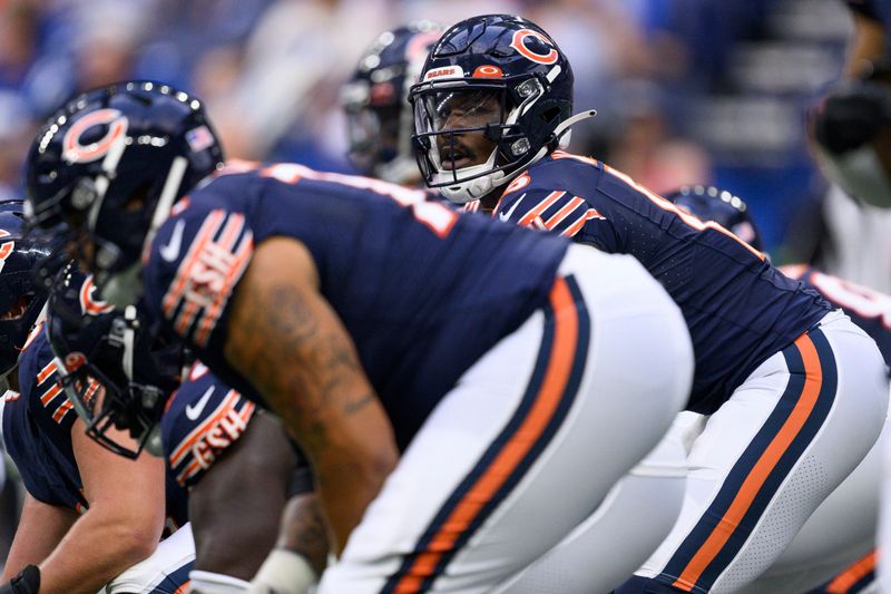 Chicago Bears quarterback P.J. Walker (15) looks to the sidelines during an NFL football game against the Indianapolis Colts, Saturday, Aug. 19, 2023, in Indianapolis. (AP Photo/Zach Bolinger)