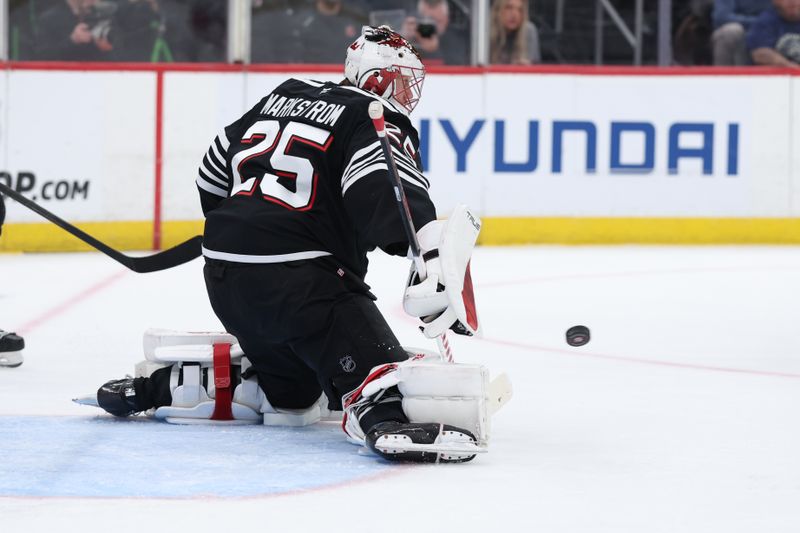 Jan 17, 2026; Newark, New Jersey, USA; New Jersey Devils goaltender Jacob Markstrom (25) makes a save against the Carolina Hurricanes during the first period at Prudential Center. Mandatory Credit: Thomas Salus-Imagn Images
