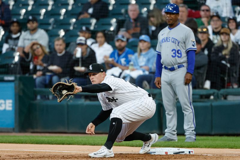 Sep 13, 2023; Chicago, Illinois, USA; Chicago White Sox first baseman Andrew Vaughn (25) catches a ball at first base for a Kansas City Royals out during the first inning at Guaranteed Rate Field. Mandatory Credit: Kamil Krzaczynski-USA TODAY Sports