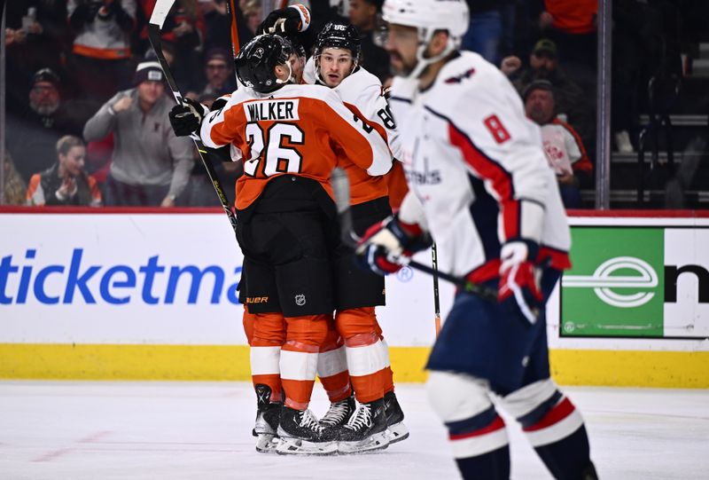 Dec 14, 2023; Philadelphia, Pennsylvania, USA; Philadelphia Flyers left wing Joel Farabee (86) celebrates with teammates after scoring a goal against the Washington Capitals in the third period at Wells Fargo Center. Mandatory Credit: Kyle Ross-USA TODAY Sports