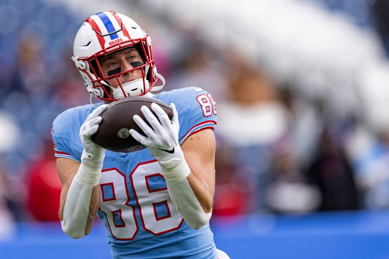 Tennessee Titans tight end Kevin Rader (86) catches the ball during warmups before their NFL football game against the Houston Texans Sunday, Dec. 17, 2023, in Nashville, Tenn. (AP Photo/Wade Payne)