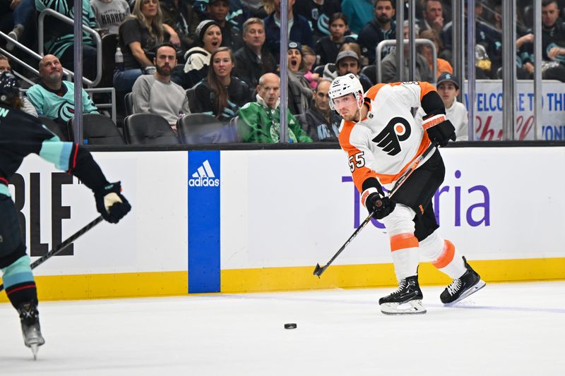 Feb 16, 2023; Seattle, Washington, USA; Philadelphia Flyers defenseman Rasmus Ristolainen (55) passes the puck against the Seattle Kraken during the second period at Climate Pledge Arena. Mandatory Credit: Steven Bisig-USA TODAY Sports