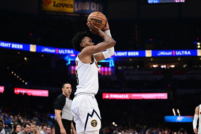 OKLAHOMA CITY, OKLAHOMA - JANUARY 31: Peyton Watson #8 of the Denver Nuggets goes up for a shot during the second half against the Oklahoma City Thunder at Paycom Center on January 31, 2024 in Oklahoma City, Oklahoma. NOTE TO USER: User expressly acknowledges and agrees that, by downloading and or using this Photograph, user is consenting to the terms and conditions of the Getty Images License Agreement. (Photo by Joshua Gateley/Getty Images)