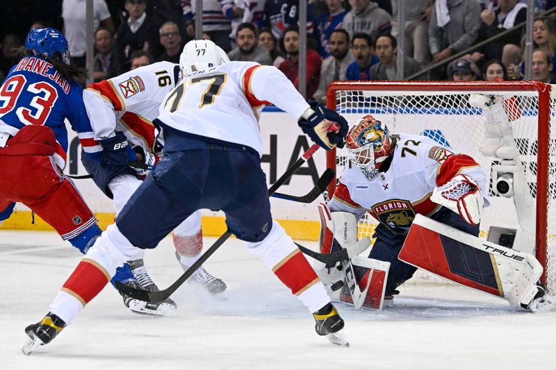 May 30, 2024; New York, New York, USA; Florida Panthers goaltender Sergei Bobrovsky (72) makes a save on New York Rangers center Mika Zibanejad (93) during the first period in game five of the Eastern Conference Final of the 2024 Stanley Cup Playoffs at Madison Square Garden. Mandatory Credit: Dennis Schneidler-USA TODAY Sports