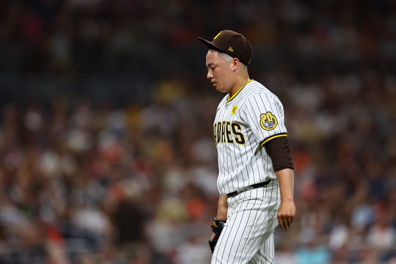 Sep 7, 2024; San Diego, California, USA; San Diego Padres relief pitcher Yuki Matsui (1) looks on after the ninth inning against the San Francisco Giants at Petco Park. Mandatory Credit: Chadd Cady-Imagn Images