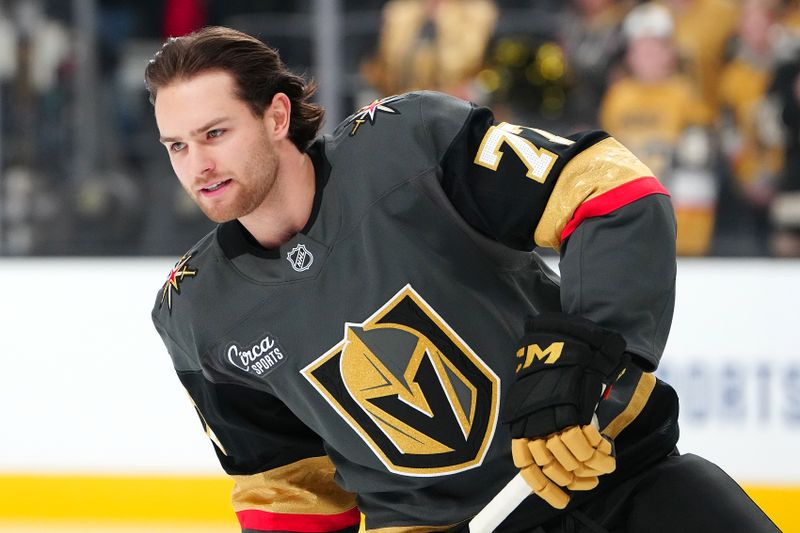 Feb 4, 2026; Las Vegas, Nevada, USA; Vegas Golden Knights center Kai Uchacz (77) takes a rookie lap before the start of a game against the Vancouver Canucks at T-Mobile Arena. Mandatory Credit: Stephen R. Sylvanie-Imagn Images