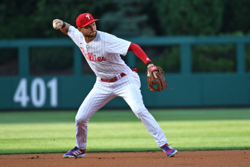 Jun 17, 2024; Philadelphia, Pennsylvania, USA; Philadelphia Phillies shortstop Trea Turner (7) throws to first base during the first inning against the San Diego Padres at Citizens Bank Park. Mandatory Credit: Eric Hartline-USA TODAY Sports