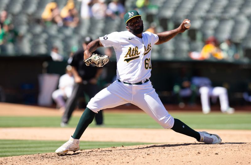 Aug 20, 2023; Oakland, California, USA; Oakland Athletics pitcher Francisco Perez (60) delivers a pitch against the Baltimore Orioles during the ninth inning at Oakland-Alameda County Coliseum. Mandatory Credit: D. Ross Cameron-USA TODAY Sports