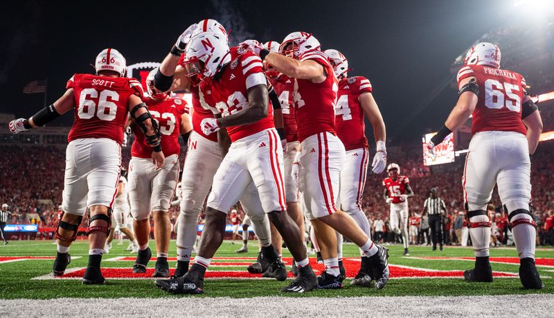 Sep 16, 2023; Lincoln, Nebraska, USA; Nebraska Cornhuskers celebrate after a touchdown by running back Anthony Grant (23) against the Northern Illinois Huskies during the fourth quarter at Memorial Stadium. Mandatory Credit: Dylan Widger-USA TODAY Sports