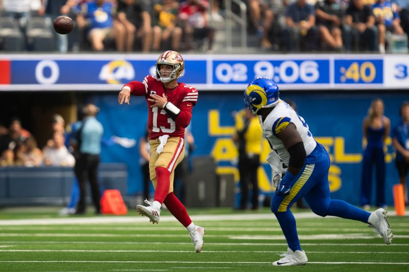 San Francisco 49ers quarterback Brock Purdy (13) throws a pass during an NFL football game against the Los Angeles Rams, Sunday, Sept. 22, 2024, in Inglewood, Calif. (AP Photo/Kyusung Gong)