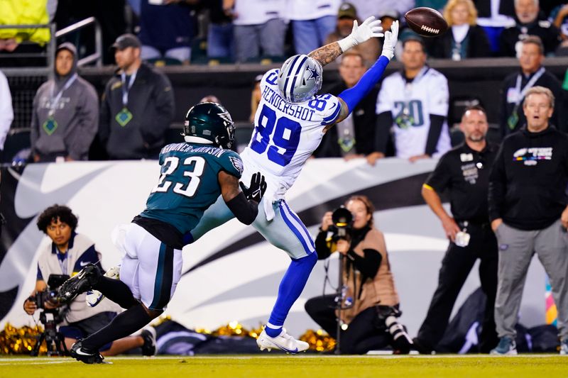 Dallas Cowboys' Peyton Hendershot can't catch a pass in front of Philadelphia Eagles' C.J. Gardner-Johnson during the second half of an NFL football game Sunday, Oct. 16, 2022, in Philadelphia. (AP Photo/Matt Slocum)