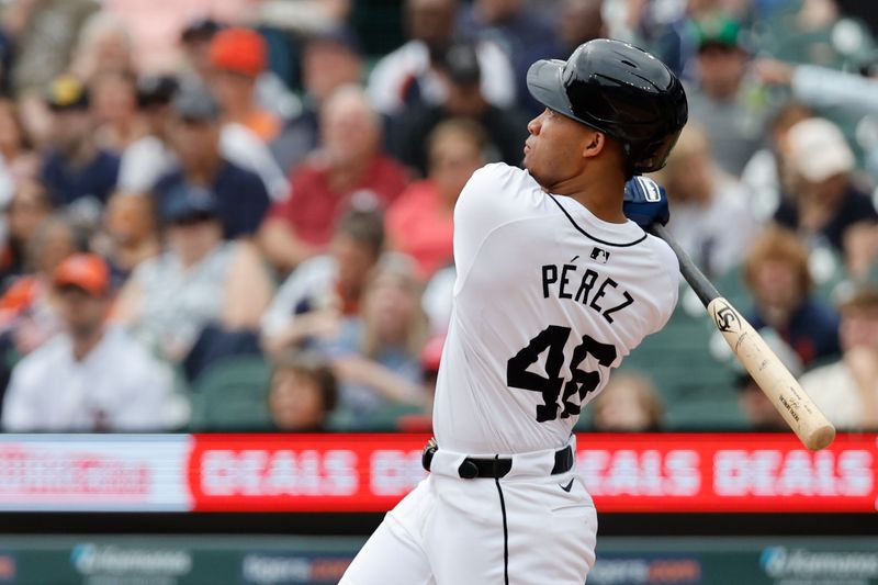 Apr 28, 2024; Detroit, Michigan, USA;  Detroit Tigers right fielder Wenceel Perez (46) hits a two run home run in the first inning against the Kansas City Royals at Comerica Park. Mandatory Credit: Rick Osentoski-USA TODAY Sports