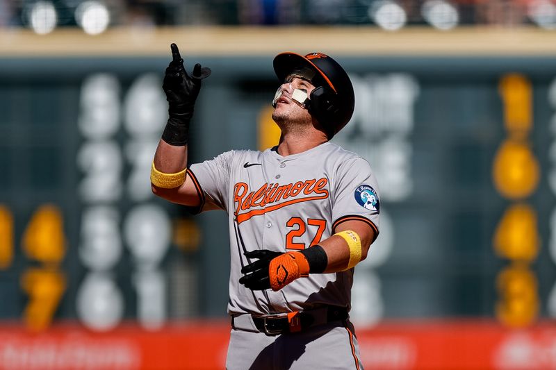 Sep 1, 2024; Denver, Colorado, USA; Baltimore Orioles catcher James McCann (27) reacts from second on a double in the ninth inning against the Colorado Rockies at Coors Field. Mandatory Credit: Isaiah J. Downing-USA TODAY Sports