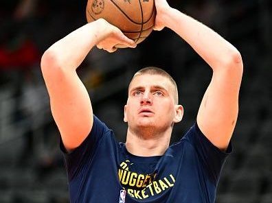 ATLANTA, GA - DECEMBER 11: Nikola Jokic #15 of the Denver Nuggets shoots the ball before the game against the Atlanta Hawks on December 11, 2023 at State Farm Arena in Atlanta, Georgia.  NOTE TO USER: User expressly acknowledges and agrees that, by downloading and/or using this Photograph, user is consenting to the terms and conditions of the Getty Images License Agreement. Mandatory Copyright Notice: Copyright 2023 NBAE (Photo by Adam Hagy/NBAE via Getty Images)