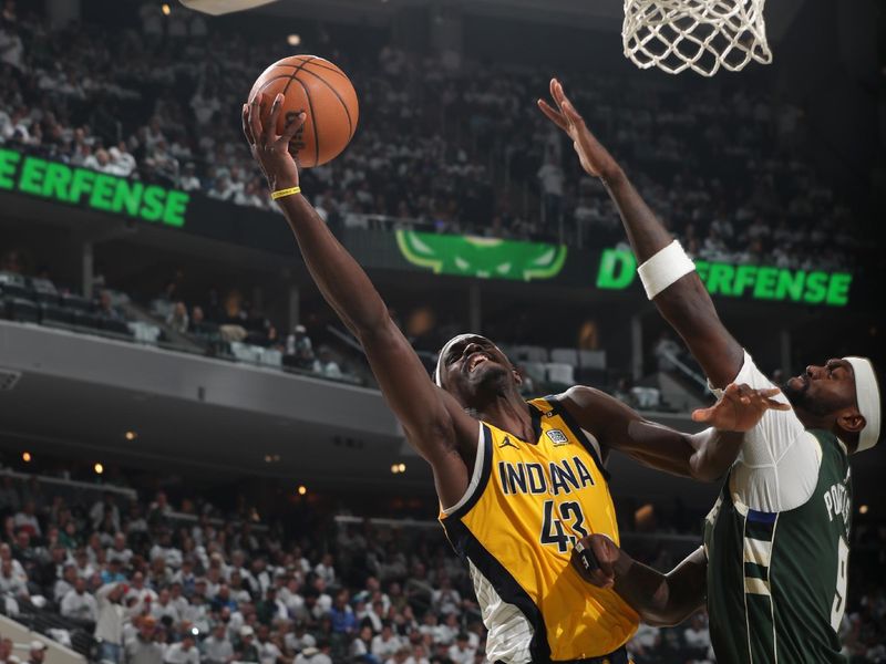 MILWAUKEE, WI - APRIL 23: Pascal Siakam #43 of the Indiana Pacers drives to the basket during the game against the Milwaukee Bucks during Round One Game Two of the 2024 NBA Playoffs on April 23, 2024 at the Fiserv Forum Center in Milwaukee, Wisconsin. NOTE TO USER: User expressly acknowledges and agrees that, by downloading and or using this Photograph, user is consenting to the terms and conditions of the Getty Images License Agreement. Mandatory Copyright Notice: Copyright 2024 NBAE (Photo by Gary Dineen/NBAE via Getty Images).