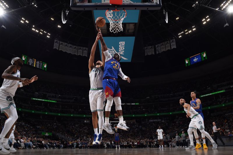 DENVER, CO - MARCH 29: Reggie Jackson #7 of the Denver Nuggets rebounds the ball during the game against the Minnesota Timberwolves on March 29, 2024 at the Ball Arena in Denver, Colorado. NOTE TO USER: User expressly acknowledges and agrees that, by downloading and/or using this Photograph, user is consenting to the terms and conditions of the Getty Images License Agreement. Mandatory Copyright Notice: Copyright 2024 NBAE (Photo by Garrett Ellwood/NBAE via Getty Images)