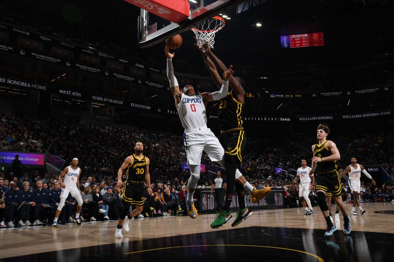 SAN FRANCISCO, CA - FEBRUARY 14: Russell Westbrook #0 of the LA Clippers drives to the basket during the game against the Golden State Warriors on FEBRUARY 14, 2024 at Chase Center in San Francisco, California. NOTE TO USER: User expressly acknowledges and agrees that, by downloading and or using this photograph, user is consenting to the terms and conditions of Getty Images License Agreement. Mandatory Copyright Notice: Copyright 2024 NBAE (Photo by Noah Graham/NBAE via Getty Images)