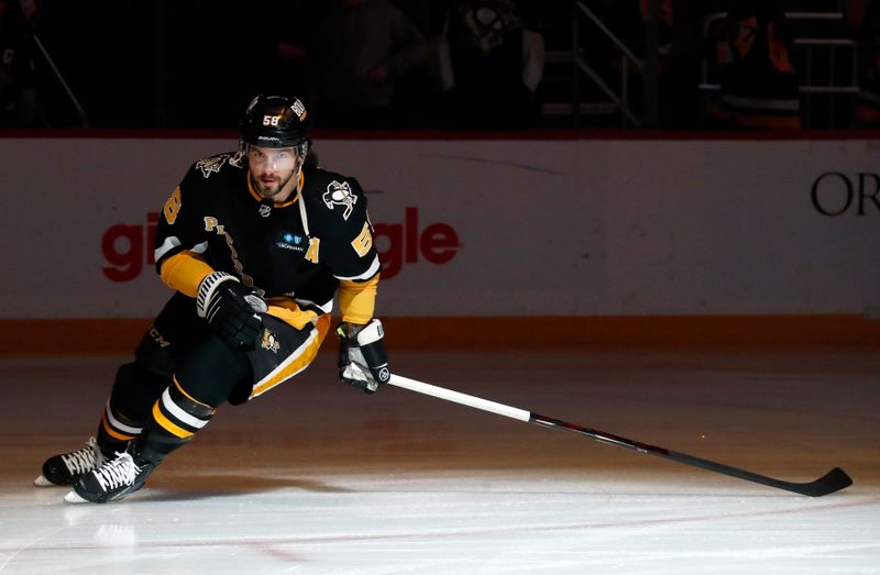 Apr 6, 2023; Pittsburgh, Pennsylvania, USA; Pittsburgh Penguins defenseman Kris Letang (58) takes the ice against the Minnesota Wild during the first period at PPG Paints Arena. Mandatory Credit: Charles LeClaire-USA TODAY Sports