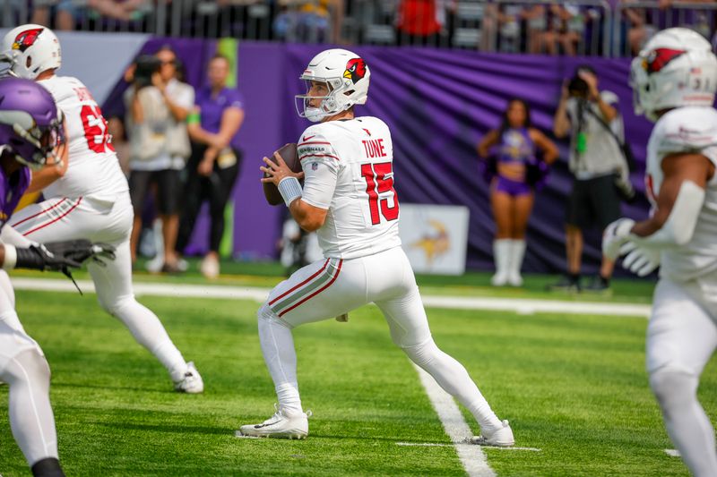 Arizona Cardinals quarterback Clayton Tune (15) looks to throw against the Minnesota Vikings during the first half of an NFL preseason football game, Saturday, Aug. 26, 2023, in Minneapolis. (AP Photo/Bruce Kluckhohn)