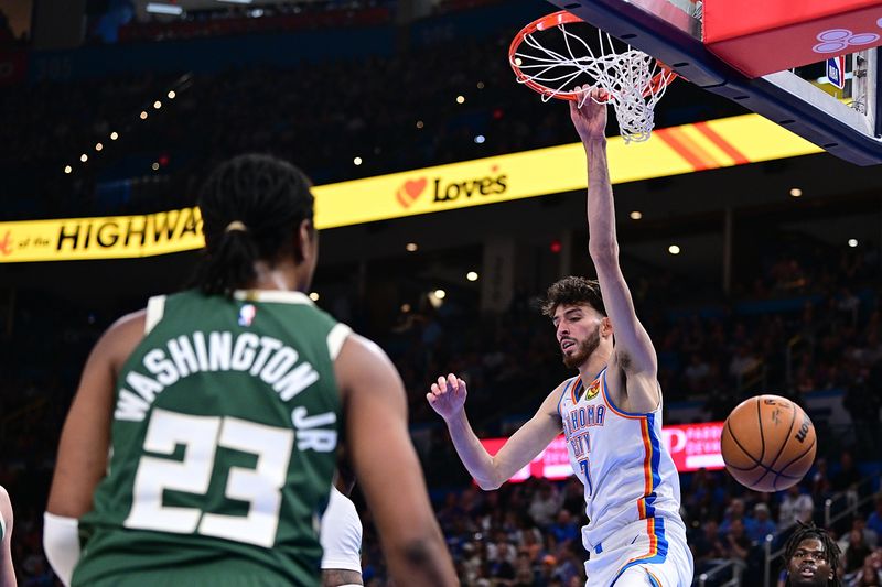 OKLAHOMA CITY, OKLAHOMA - APRIL 12: Chet Holmgren #7 of the Oklahoma City Thunder finished a dunk during the second half against the Milwaukee Bucks at Paycom Center on April 12, 2024 in Oklahoma City, Oklahoma. NOTE TO USER: User expressly acknowledges and agrees that, by downloading and or using this Photograph, user is consenting to the terms and conditions of the Getty Images License Agreement. (Photo by Joshua Gateley/Getty Images)