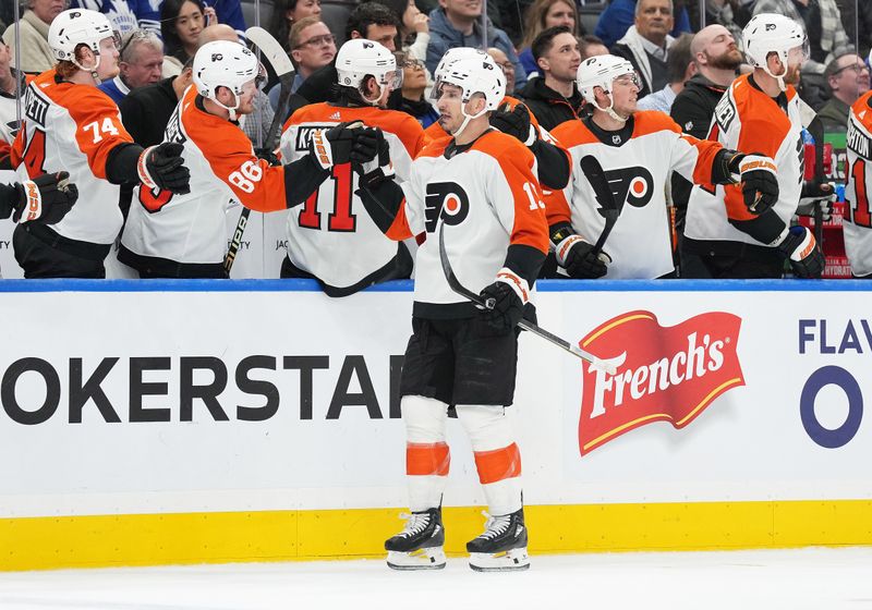 Feb 15, 2024; Toronto, Ontario, CAN; Philadelphia Flyers right wing Garnet Hathaway (19) celebrates with teammates after scoring a goal against the Toronto Maple Leafs during the third period at Scotiabank Arena. Mandatory Credit: Nick Turchiaro-USA TODAY Sports