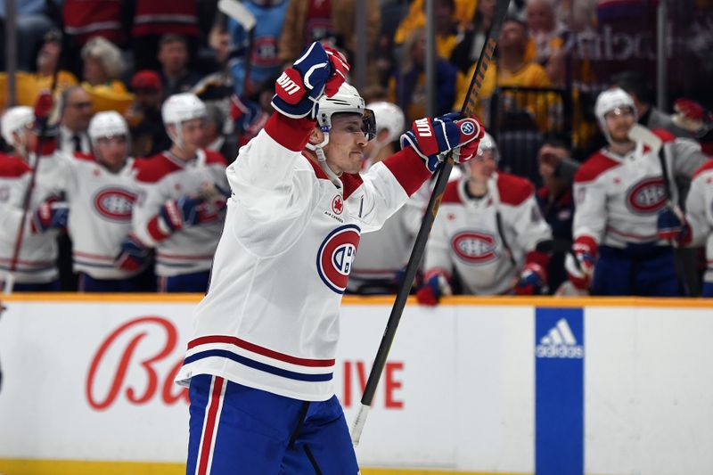 Mar 5, 2024; Nashville, Tennessee, USA; Montreal Canadiens right wing Brendan Gallagher (11) celebrates after a goal during the second period against the Nashville Predators at Bridgestone Arena. Mandatory Credit: Christopher Hanewinckel-USA TODAY Sports