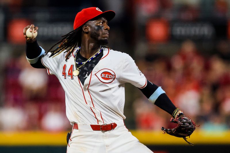 Jul 9, 2024; Cincinnati, Ohio, USA; Cincinnati Reds shortstop Elly De La Cruz (44) throws to first to get Colorado Rockies second baseman Brendan Rodgers (not pictured) out in the fifth inning at Great American Ball Park. Mandatory Credit: Katie Stratman-USA TODAY Sports