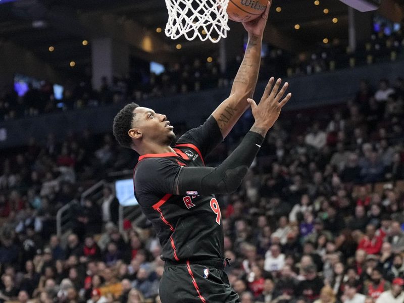 TORONTO, ON - DECEMBER 3:  RJ Barrett #9 of the Toronto Raptors drives to the basket during the first half against the Indiana Pacers during the Emirates NBA Cup game at the Scotiabank Arena on December 3, 2024 in Toronto, Ontario, Canada. NOTE TO USER: User expressly acknowledges and agrees that, by downloading and/or using this Photograph, user is consenting to the terms and conditions of the Getty Images License Agreement. (Photo by Kevin Sousa/Getty Images)