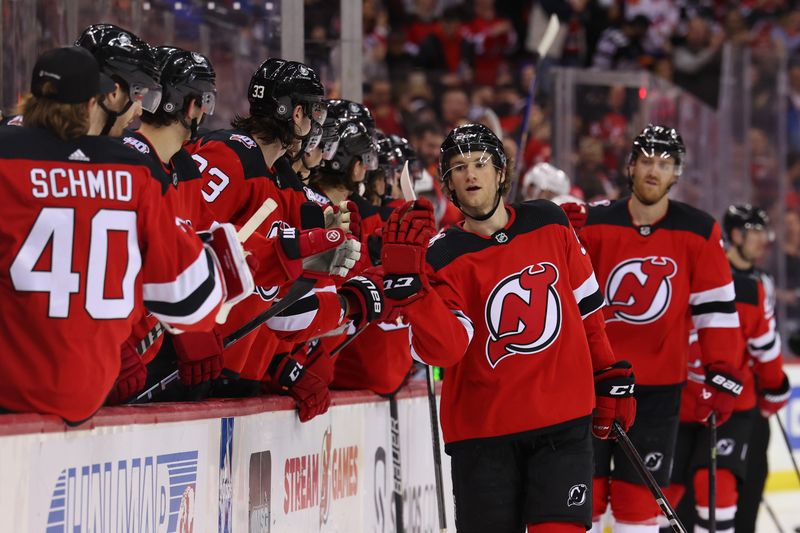 Feb 23, 2023; Newark, New Jersey, USA; New Jersey Devils center Dawson Mercer (91) celebrates his goal against the Los Angeles Kings during the third period at Prudential Center. Mandatory Credit: Ed Mulholland-USA TODAY Sports