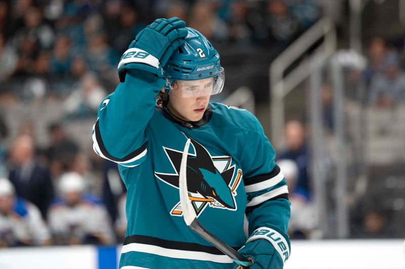 Oct 10, 2024; San Jose, California, USA; San Jose Sharks center Will Smith (2) adjusts his helmet during the first period against the St. Louis Blues at SAP Center at San Jose. Mandatory Credit: Stan Szeto-Imagn Images