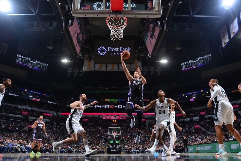 SAN ANTONIO, TX - NOVEMBER 11; Doug McDermott  #7 of the Sacramento Kings shoots the ball during the game against the San Antonio Spurs  during a regular season game on November 11, 2024 at the Frost Bank Center in San Antonio, Texas. NOTE TO USER: User expressly acknowledges and agrees that, by downloading and or using this photograph, user is consenting to the terms and conditions of the Getty Images License Agreement. Mandatory Copyright Notice: Copyright 2024 NBAE (Photos by Michael Gonzales/NBAE via Getty Images)