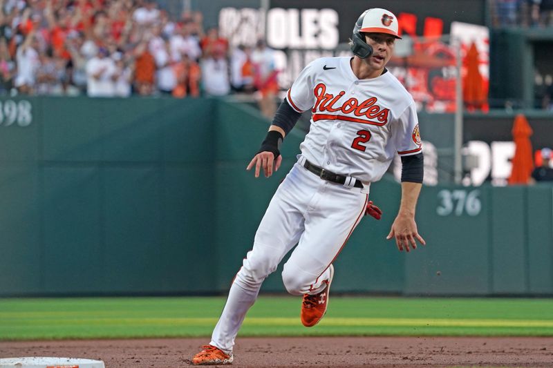 Jul 30, 2023; Baltimore, Maryland, USA; Baltimore Orioles shortstop Gunnar Henderson (2) rounds third base to score in the first inning against the New York Yankees at Oriole Park at Camden Yards. Mandatory Credit: Mitch Stringer-USA TODAY Sports