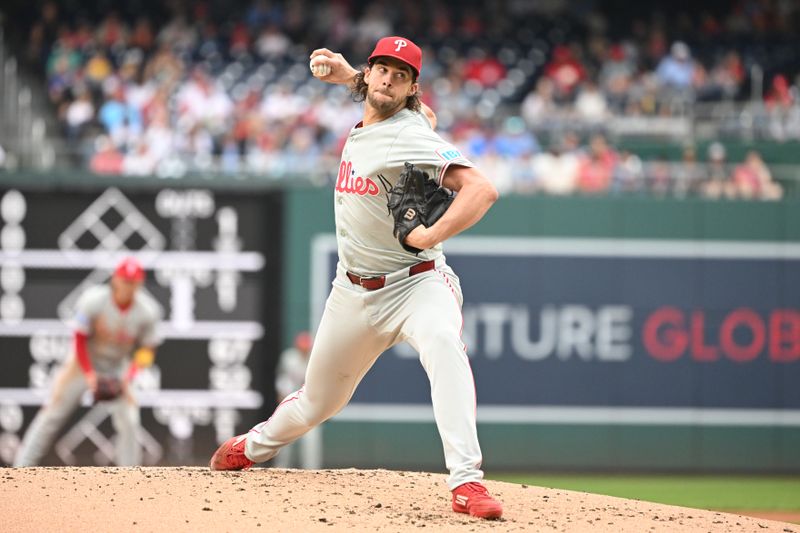 Sep 29, 2024; Washington, District of Columbia, USA; Philadelphia Phillies starting pitcher Aaron Nola (27) throws a pitch against the Washington Nationals during the first inning at Nationals Park. Mandatory Credit: Rafael Suanes-Imagn Images