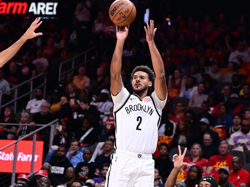 ATLANTA, GA - OCTOBER 23: Cameron Johnson #2 of the Brooklyn Nets shoots a three point basket during the game against the Atlanta Hawks on October 23, 2024 at State Farm Arena in Atlanta, Georgia.  NOTE TO USER: User expressly acknowledges and agrees that, by downloading and/or using this Photograph, user is consenting to the terms and conditions of the Getty Images License Agreement. Mandatory Copyright Notice: Copyright 2024 NBAE (Photo by Adam Hagy/NBAE via Getty Images)